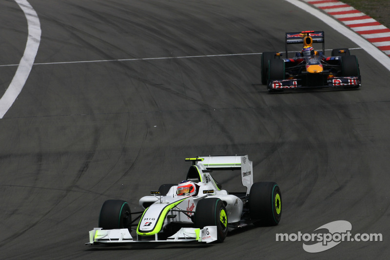 Rubens Barrichello, Brawn GP; Mark Webber, Red Bull Racing