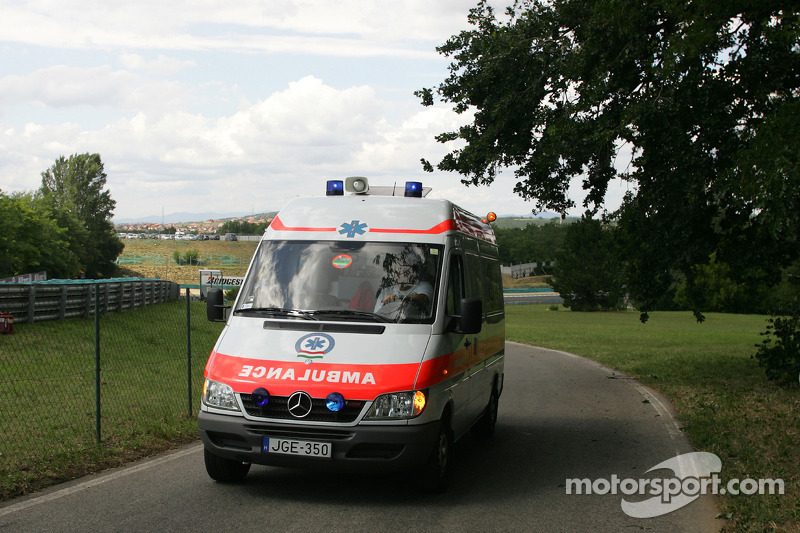 Felipe Massa is taken to the track medical center after his crash