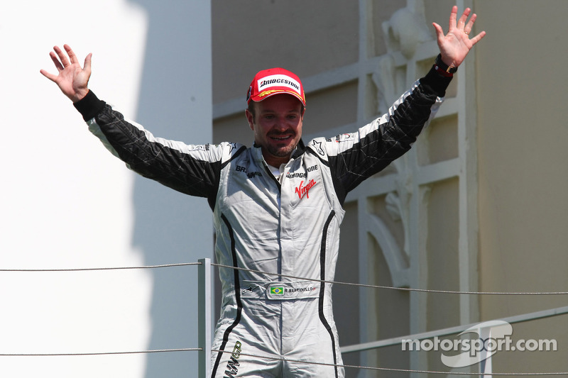 Podium: race winner Rubens Barrichello, BrawnGP celebrates