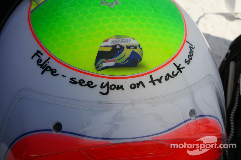 Rubens Barrichello, Brawn GP with an changed helmet design for his friend Felipe Massa, Scuderia Fer