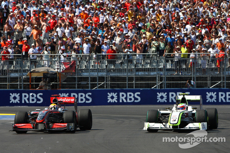 Lewis Hamilton, McLaren Mercedes and Rubens Barrichello, Brawn GP
