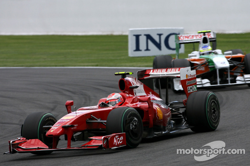 Kimi Raikkonen, Scuderia Ferrari and Giancarlo Fisichella, Force India F1 Team