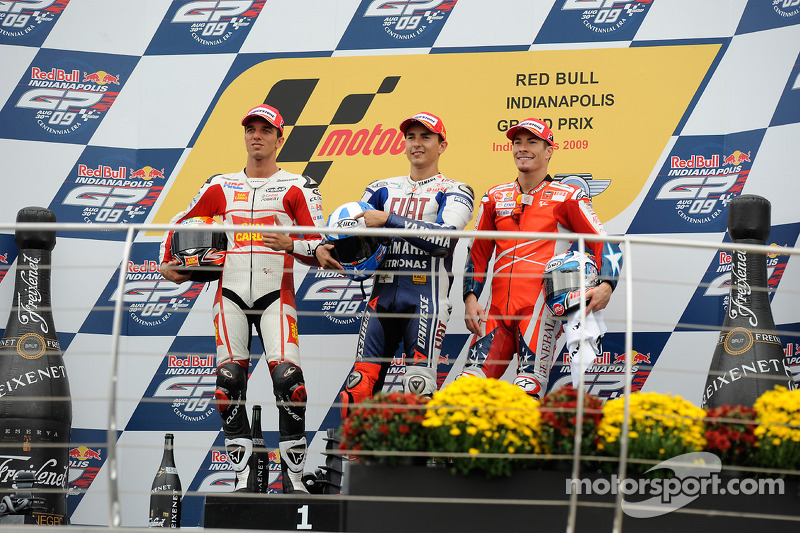 Podium: race winner Jorge Lorenzo, Fiat Yamaha Team, second place Alex De Angelis, San Carlo Honda G