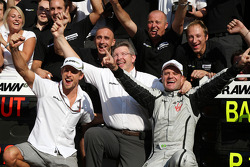 Race winner Rubens Barrichello, Brawn GP, celebrates with Jenson Button, BrawnGP, Ross Brawn, Brawn GP, Team Principal, and BrawnGP team members