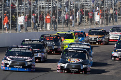Start: Kyle Busch and Mike Skinner lead the pack