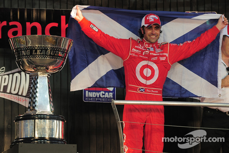 Dario Franchitti on the stage with the Indy Racing League championship trophy