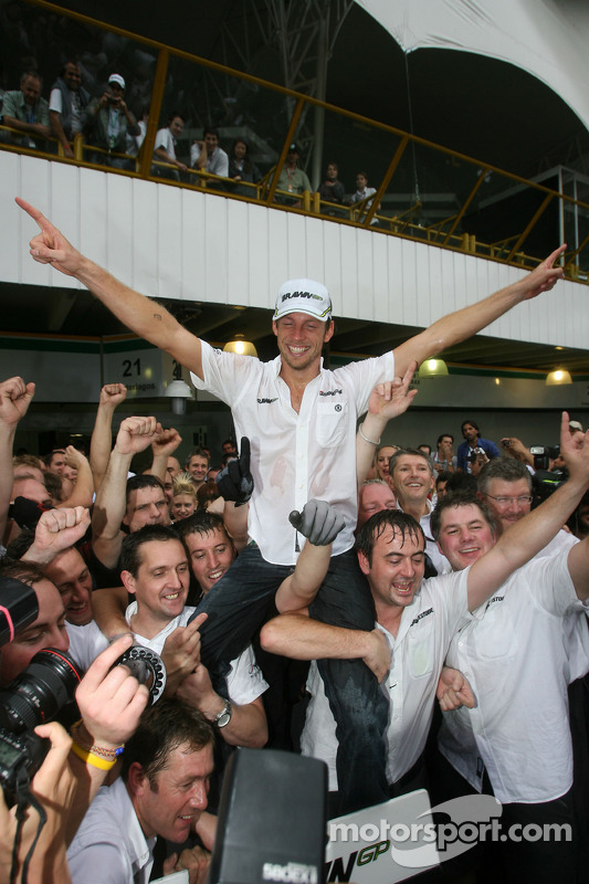 Jenson Button, Brawn GP, celebrates with the team