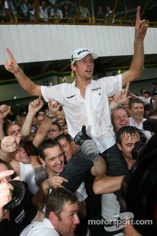 Jenson Button, Brawn GP, celebrates with the team