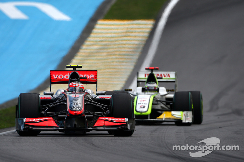 Heikki Kovalainen, McLaren Mercedes lidera a Jenson Button, BrawnGP