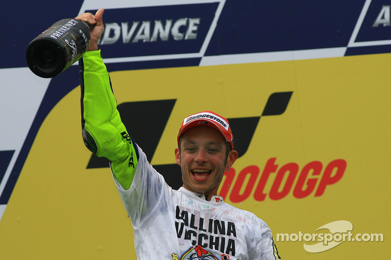 Podium: third place and 2009 MotoGP champion Valentino Rossi, Fiat Yamaha Team celebrates with champ