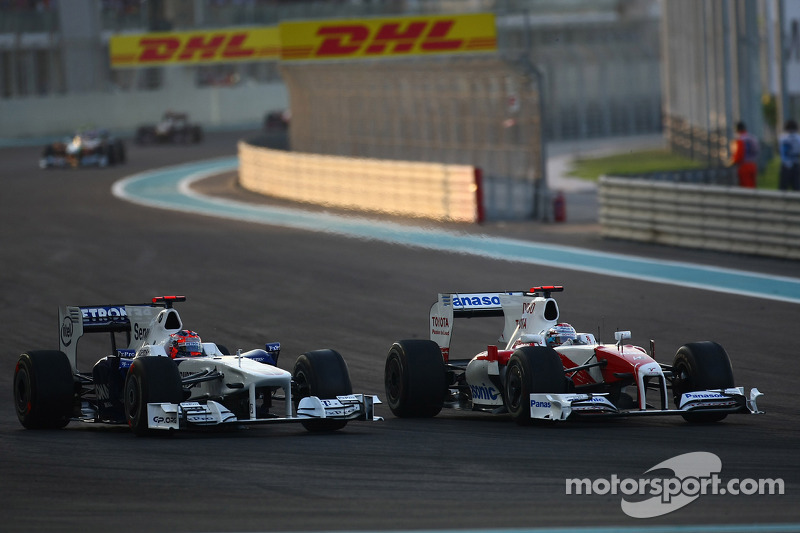 Robert Kubica, BMW Sauber F1 Team, Jarno Trulli, Toyota F1 Team, GP Abu Zabi 2009