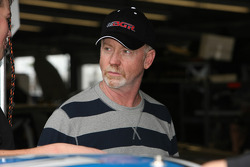 Five-time Daytona winner Bobby Gerhart waits out the rain before he gets in his No. 5 BGM Chevrolet