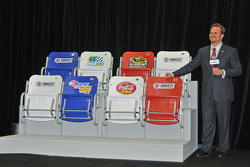 CMS track president and general manager Marcus Smith unveils new and wider seats to be installed on the speedway's frontstretch