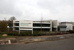 New Mercedes GP signs go up outside the factory in Brackley