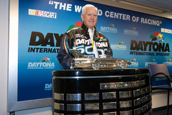 Junior Johnson poses with the Harley F. Earl Daytona 500 Trophy