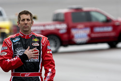 Greg Biffle listens to the National Anthem