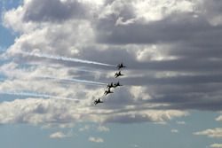 The Thunderbirds make the fly over