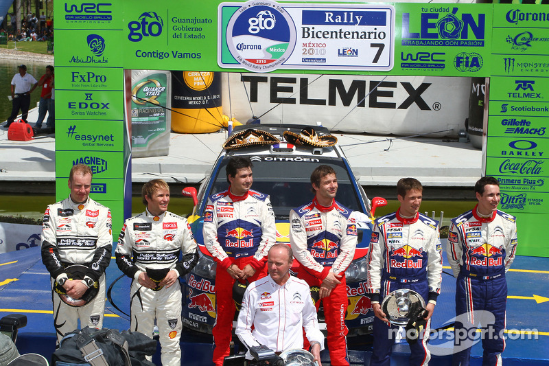 Podio: los ganadores Sébastien Loeb y Daniel Elena, Citroën C4, Citroën Total World Rally Team, segu