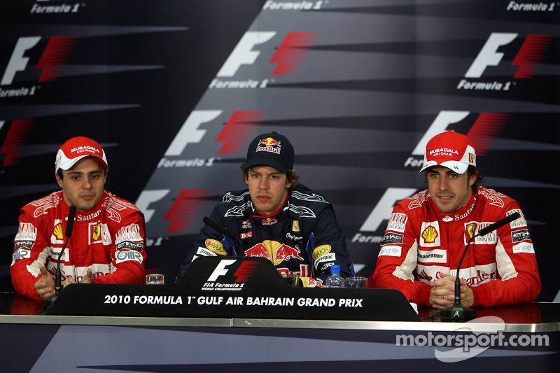 Pole winner Sebastian Vettel, Red Bull Racing, with second place Felipe Massa, Scuderia Ferrari and third place Fernando Alonso, Scuderia Ferrari