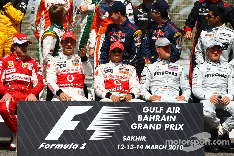 Fernando Alonso, Scuderia Ferrari con Jenson Button, McLaren Mercedes, Lewis Hamilton, McLaren Merce