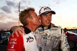 Charlie Schwerkolt and James Courtney celebrate after taking out race 9 of the 2010 V8 Supercar Championship