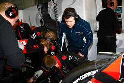A Cosworth engineer looking at the Virgin car