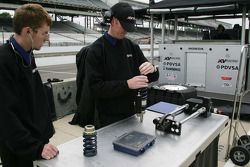 Crewmen rebuild shocks