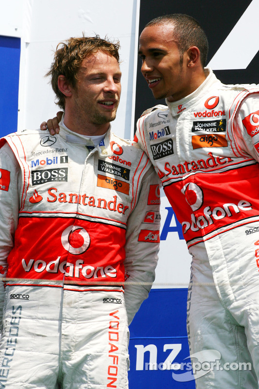 Podium: race winner Lewis Hamilton, McLaren Mercedes and second place Jenson Button, McLaren Mercede