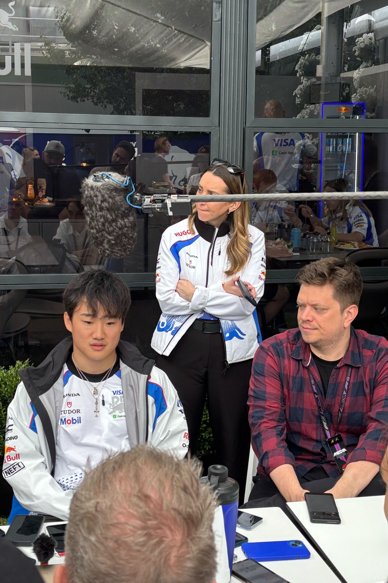 Tsunoda faces the media in his first press session of the season, pictured next to our man Cleeren