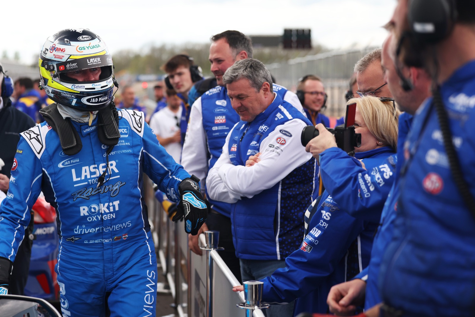 Shedden celebrates his race two podium with his new-look squad