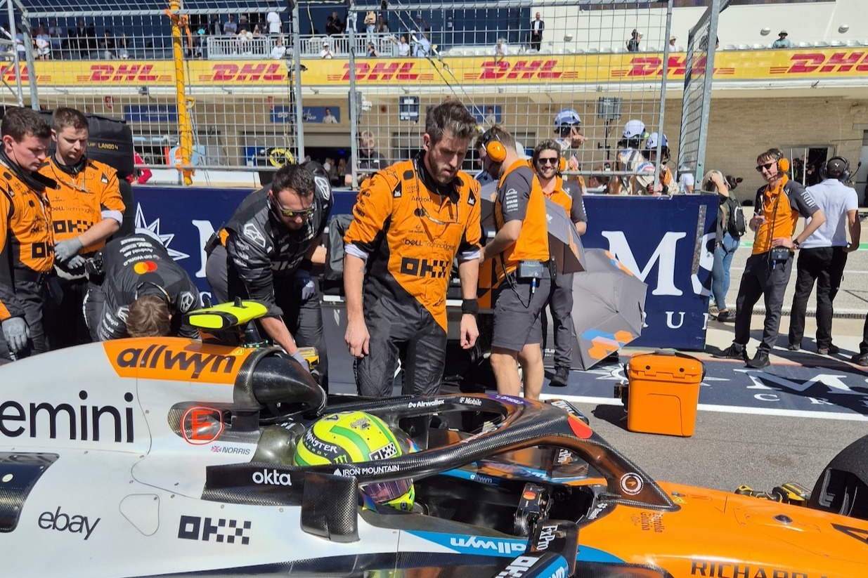The strip of tape is visible on the pitwall immediately to the left of the gate