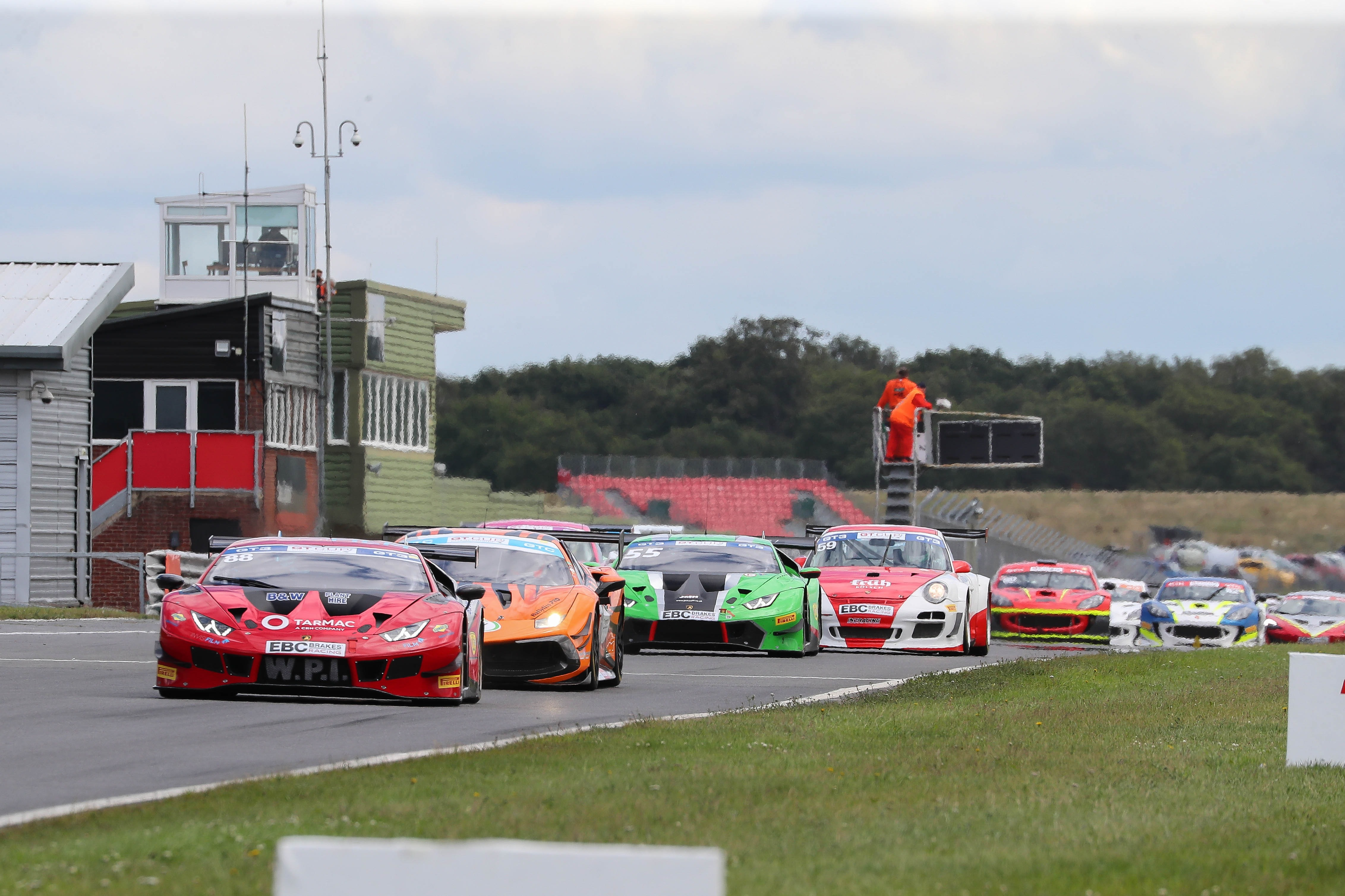 The GT Cup field storms into Riches at Snetterton