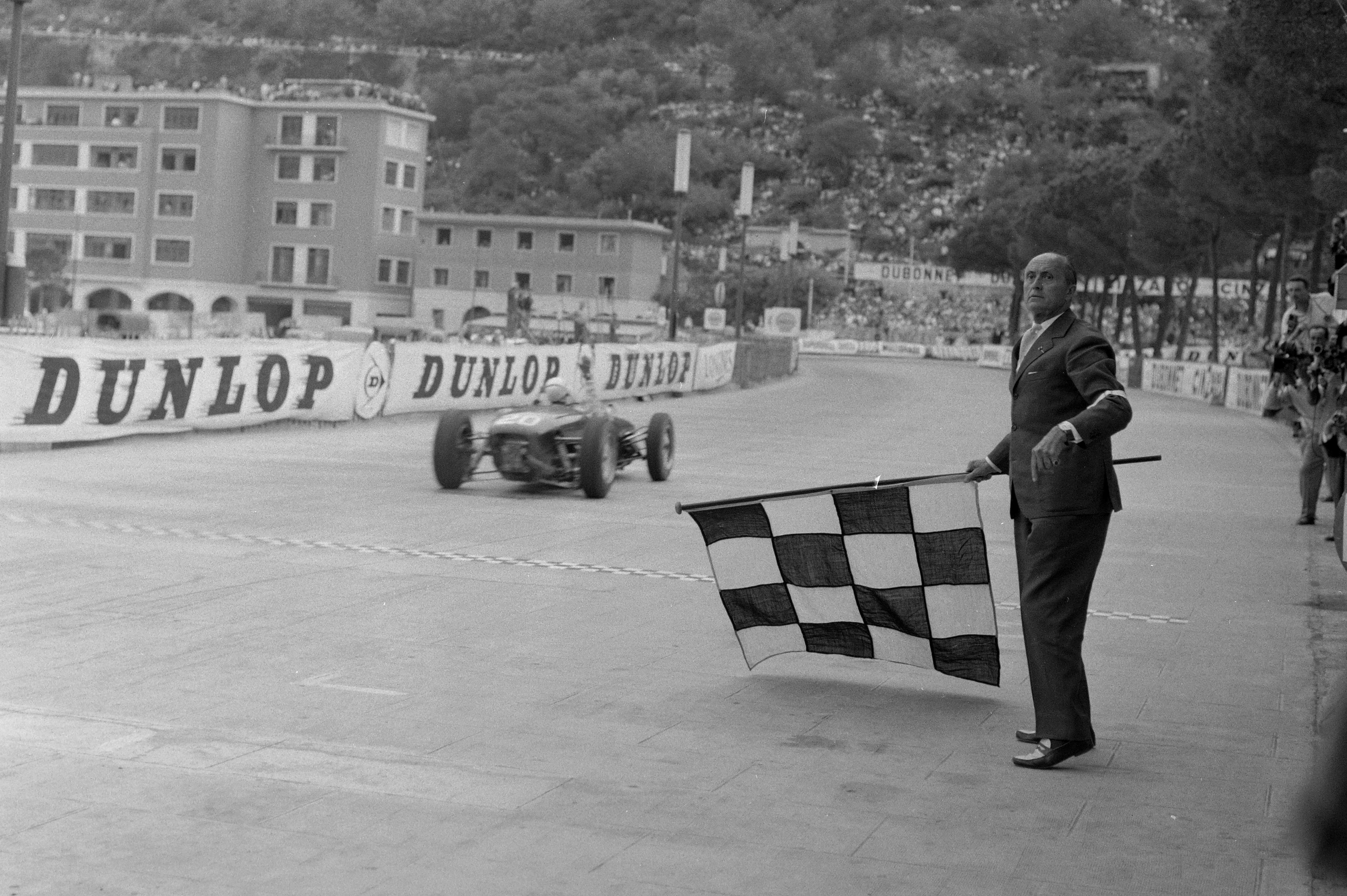 Stirling Moss, 1961 Monaco GP chequered flag