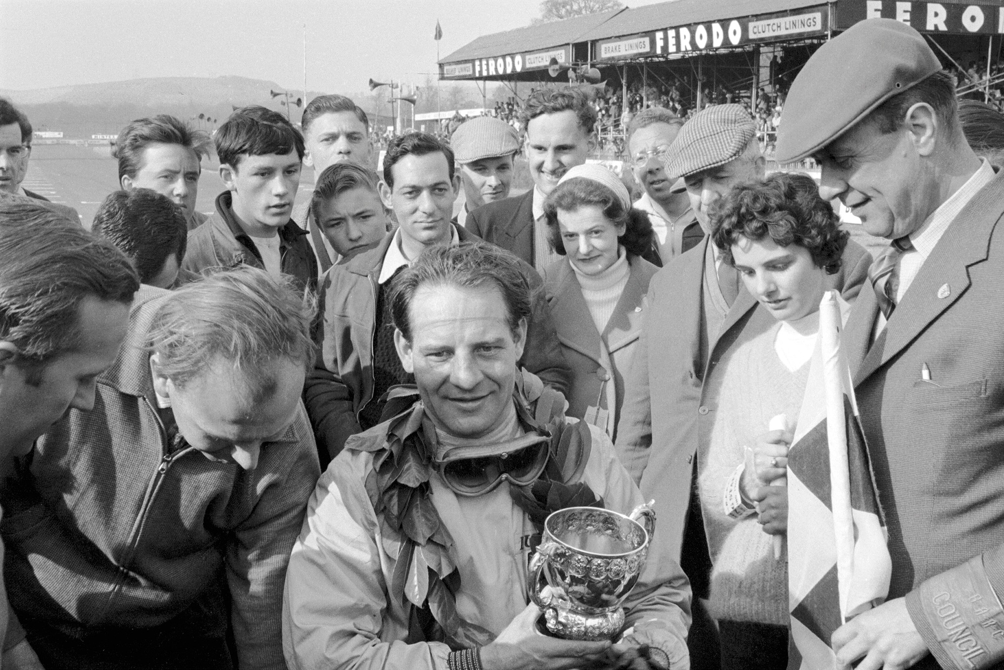 Innes Ireland claimed Lotus's first F1 victory in the non-championship Glover Trophy at Goodwood in April 1960