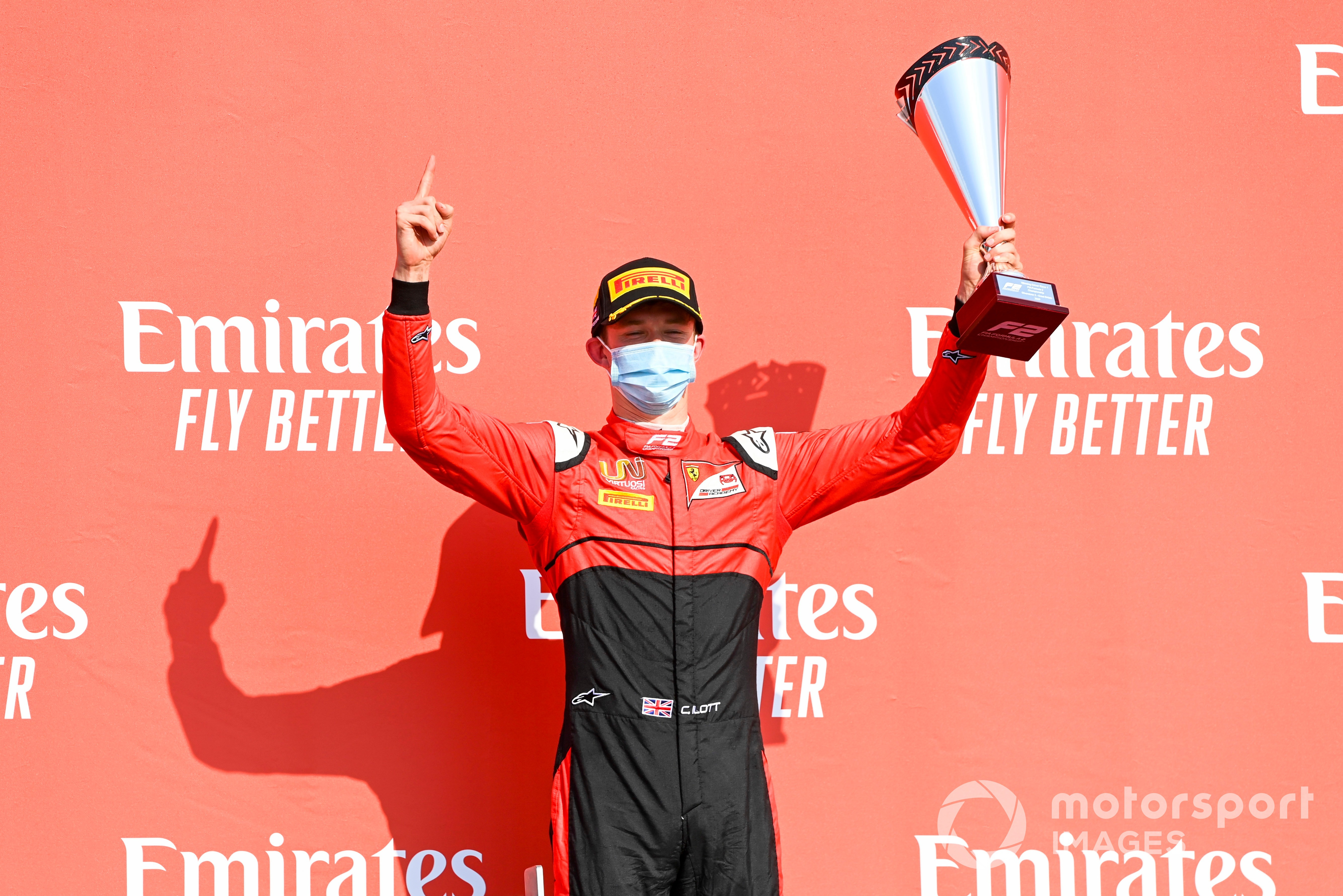 Callum Ilott (GBR, UNI-VIRTUOSI), celebrates victory with his trophy on the podium