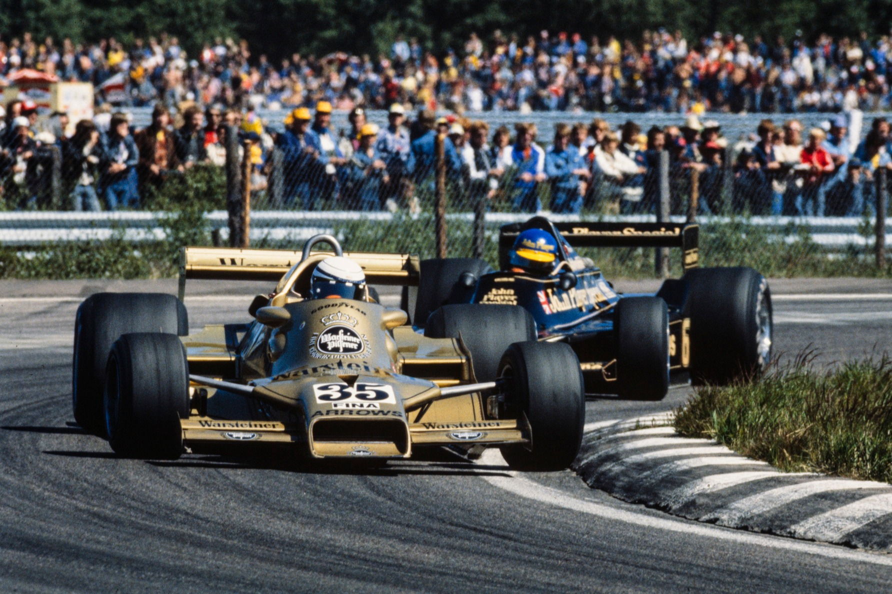 Riccardo Patrese defends from Ronnie Peterson, 1978 Swedish GP