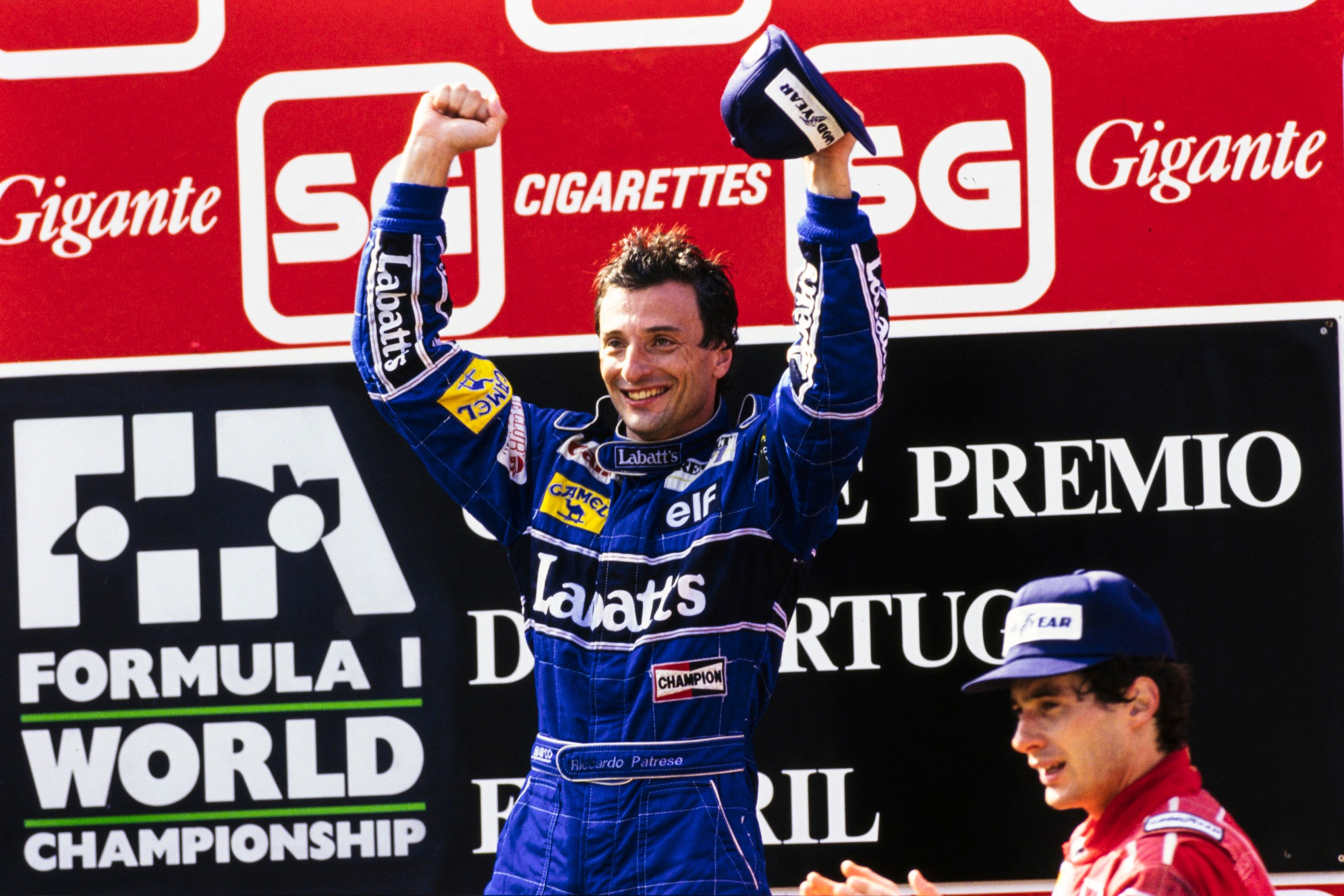 Riccardo Patrese celebrates victory in the 1991 Portuguese GP