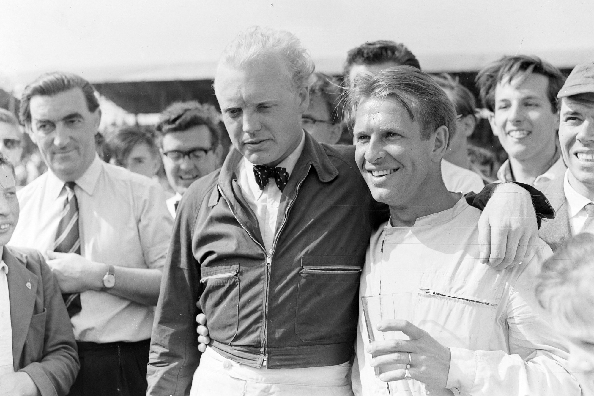 Collins is congratulated by Hawthorn after winning the 1958 British GP