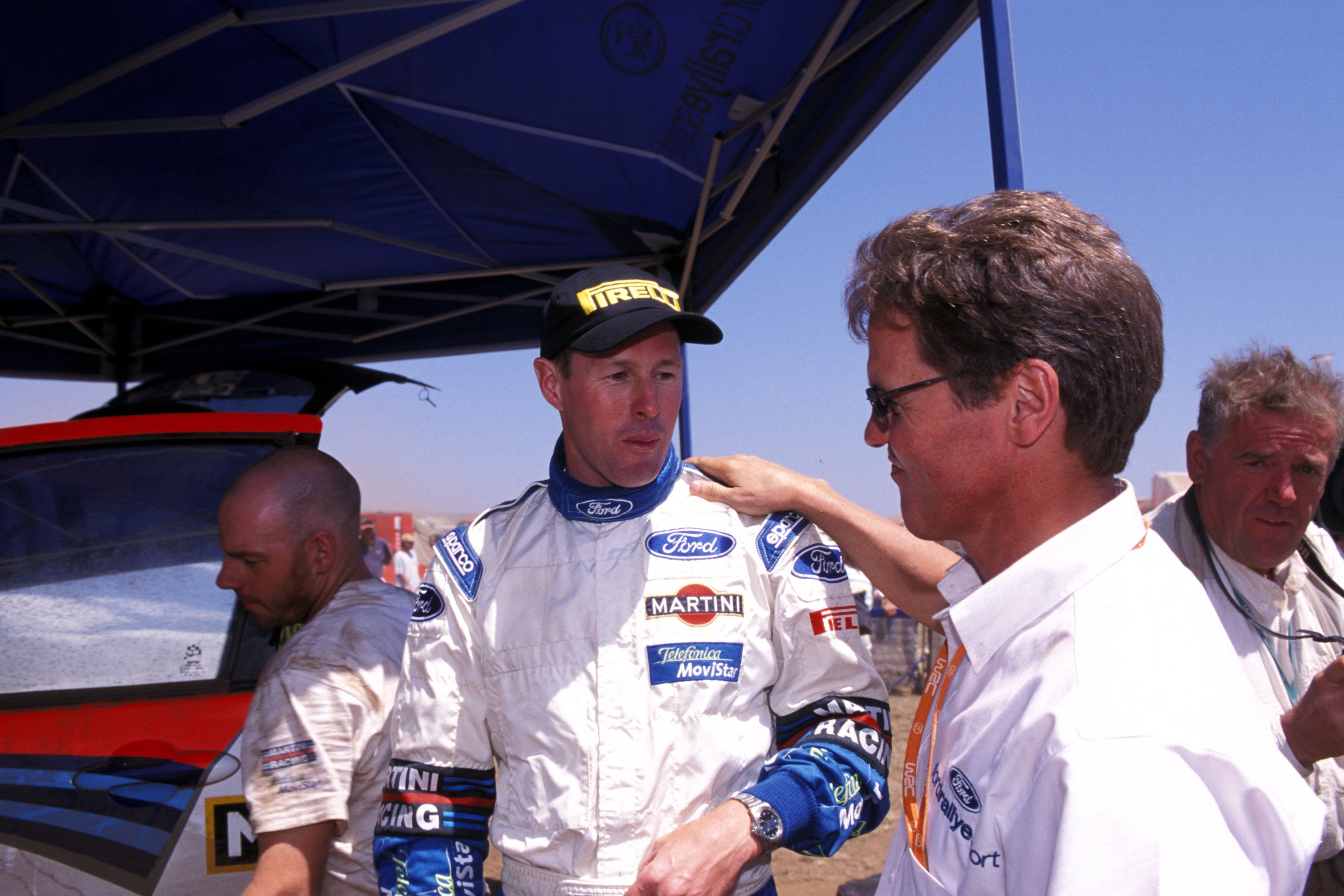 Malcolm Wilson congratulates Colin McRae on his 2002 Safari win