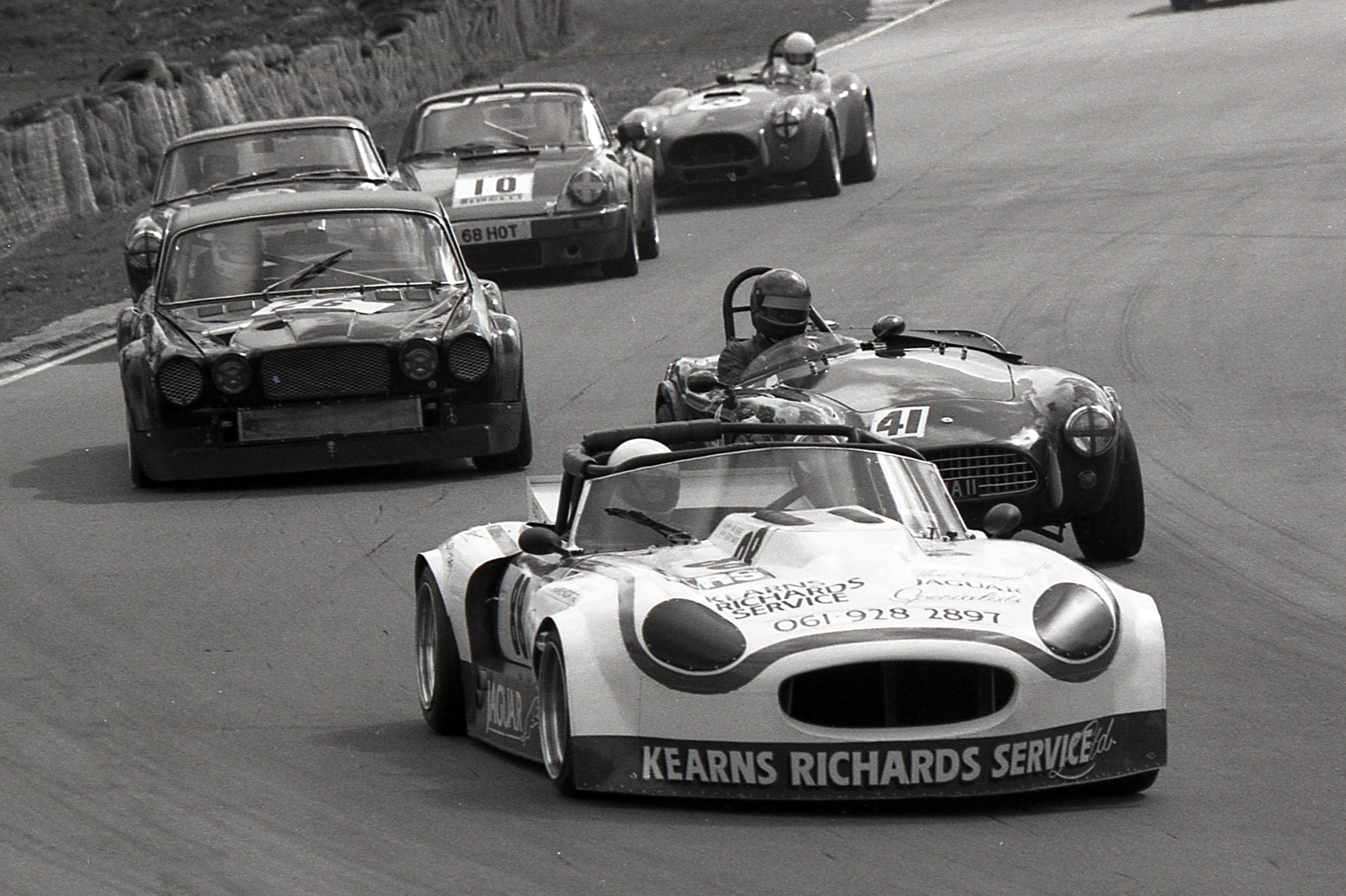 Hamilton's specced-up E-type ran as an open-top roadster in its early days