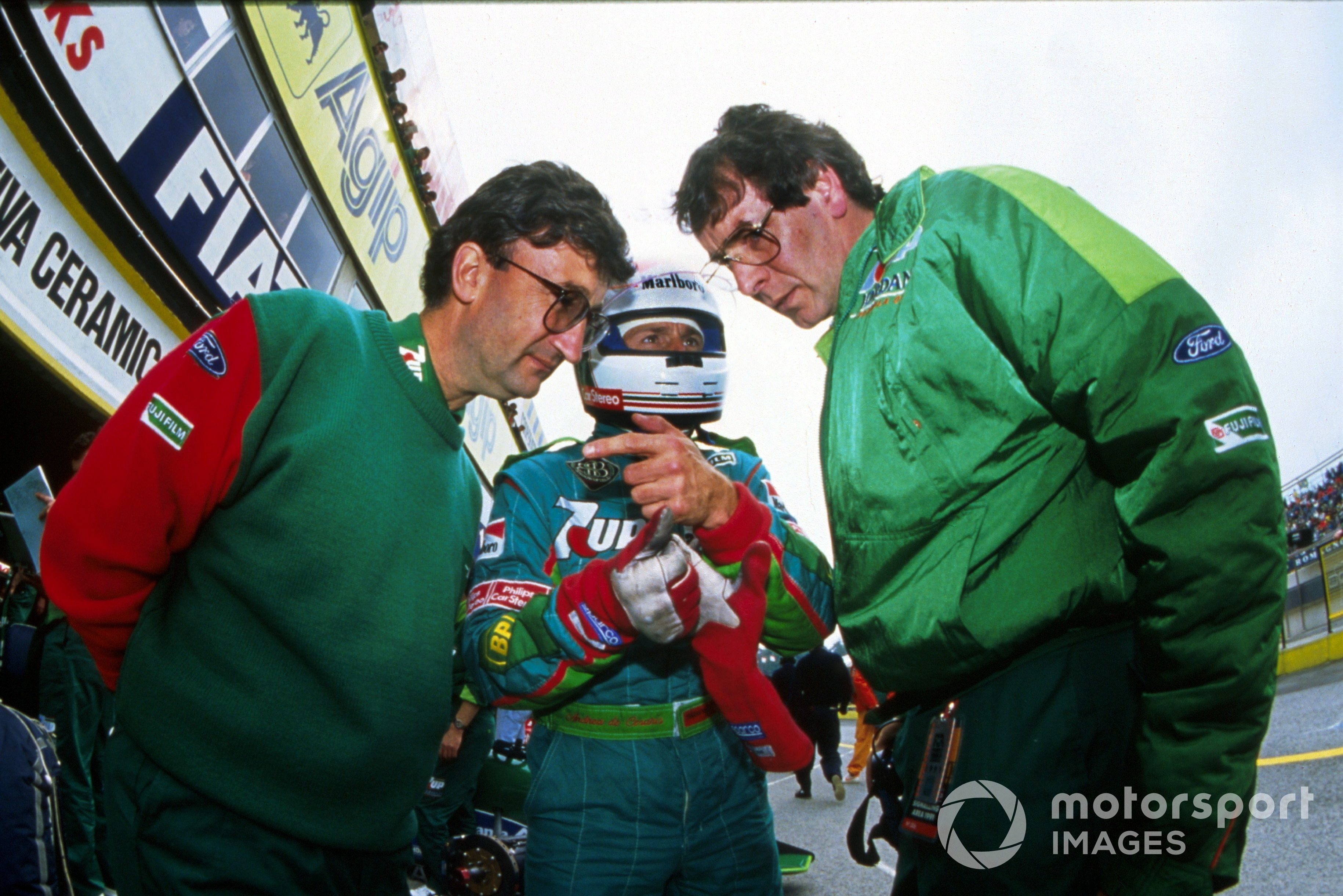 Eddie Jordan talks with Andrea de Cesaris and designer Gary Anderson on the eve of the team's F1 Grand Prix debut in 1991