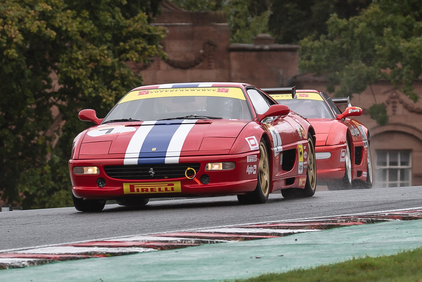 James Little and Wayne Marrs battle it out in the Pirelli Ferrari Formula Classic at Oulton Park