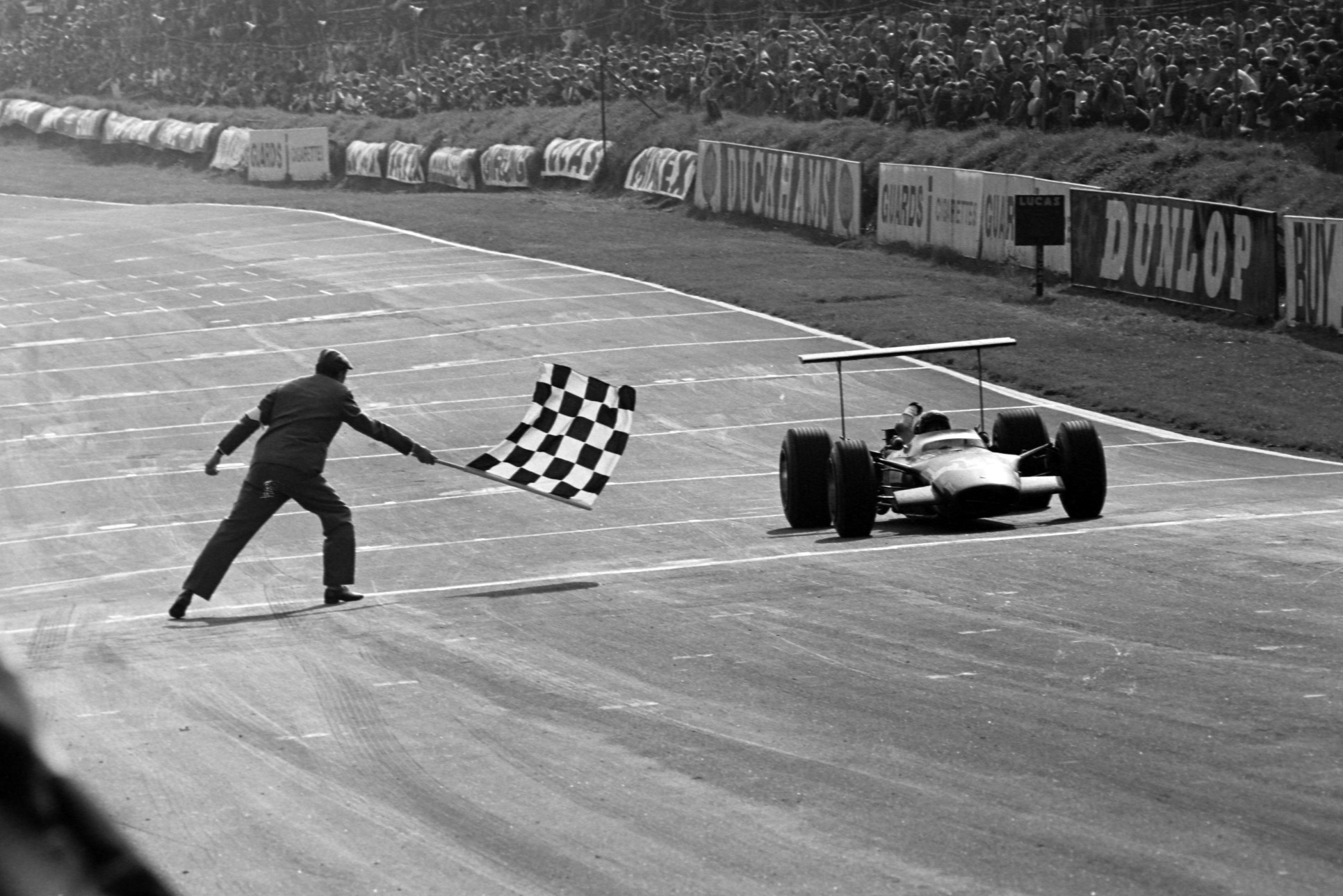 Siffert broke through for his first win in his first race with the 49B, after re-passing Amon