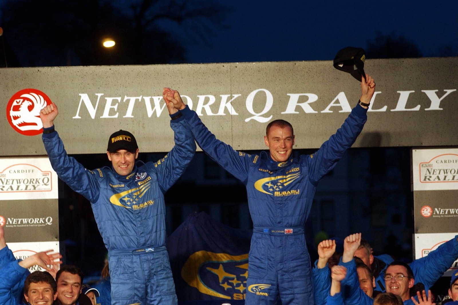 Burns and Reid celebrate their crowning glory after finishing a trouble-free third in Wales