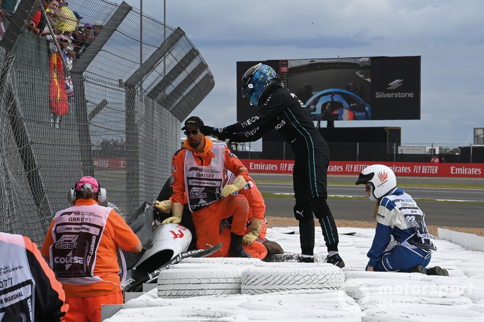 Russell rushed to the scene of Zhou's crash at the start of the 2022 British GP