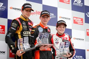 Podium at Norisring: Esteban Ocon, Max Verstappen, and Santino Ferrucci