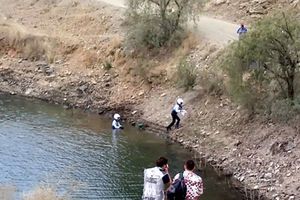 Ott Tanak and co-driver Raigo Molder emerge from a lake